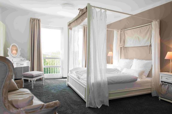 Zimmer mit Himmelbett